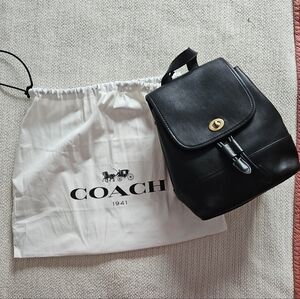 Coach Black Leather Backpack with Gold Accents